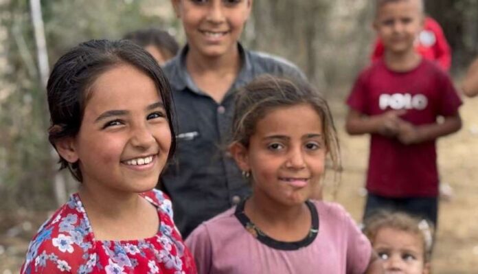 Children in Gaza celebrate the ceasefire. | Palestinian prisoners Palestinian prisoners
