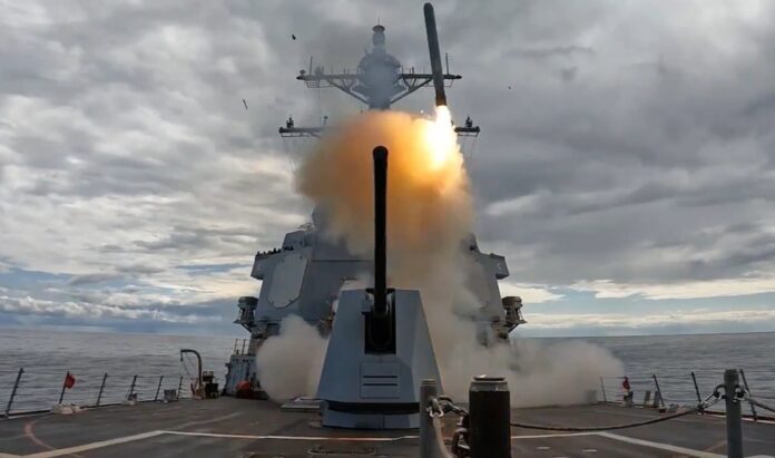 A missile being launched from US Aircraft Carrier